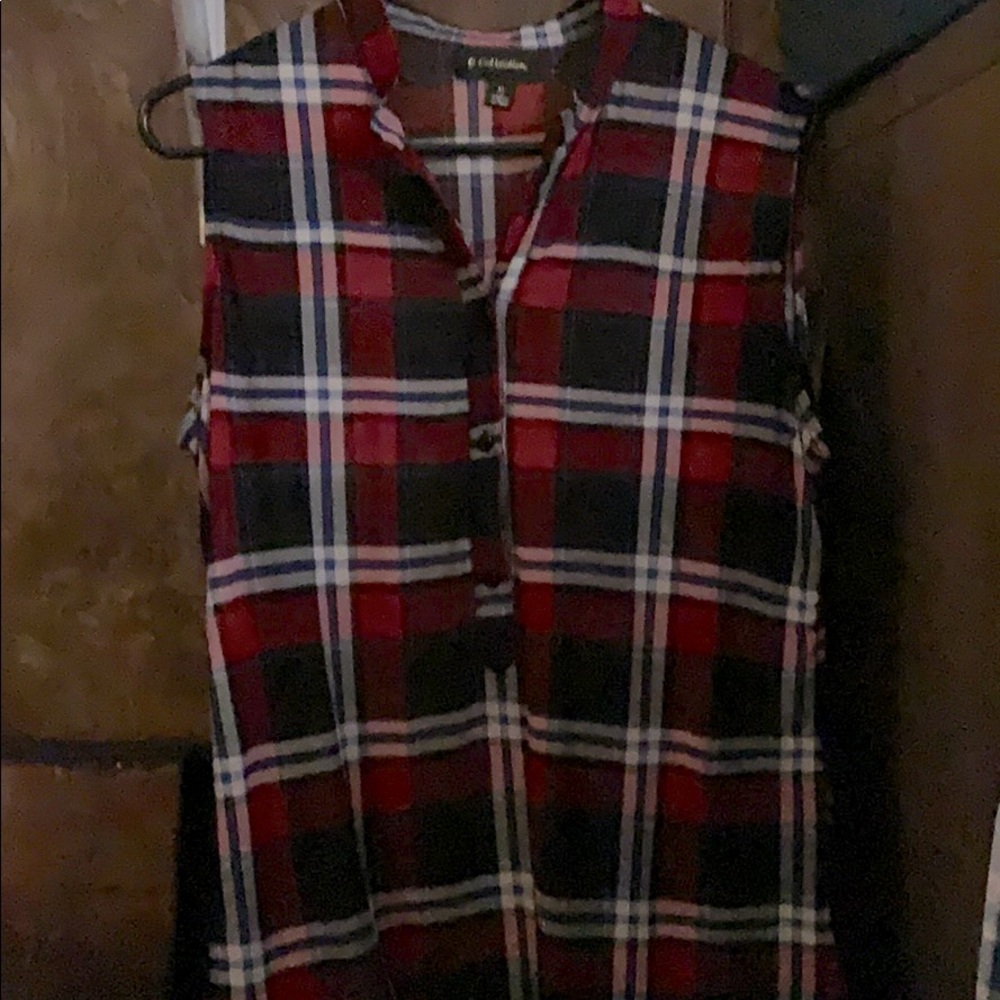 Sleeveless button down.